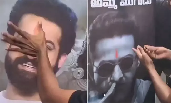 Jr NTR Fan Smears Blood Tika On Poster
