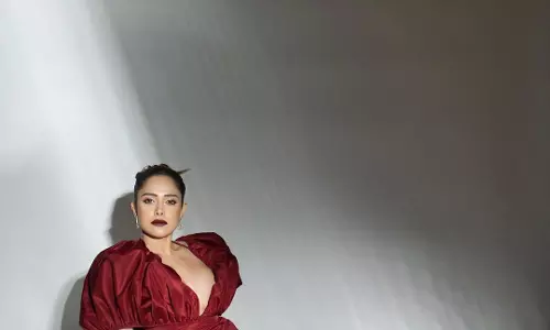 Nushrat Barucha Stuns in Red Plunging Neckline Dress