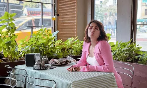 Stylish Samantha Pouts With Pink Glasses On!