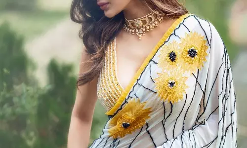 చీర కట్టులో లేడీ విలన్‌ కవ్వింపులు