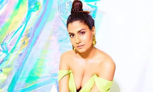 Lime Green Elegance: Shreya Dhanwantharys Stunning Fashion Statement