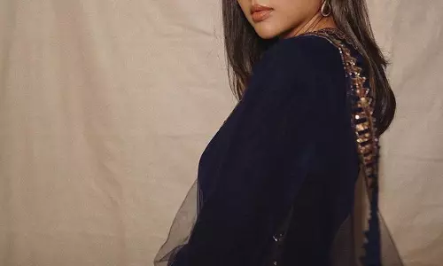 Kalyani Priyadarshan shines in a stunning blue velvet sharara suit