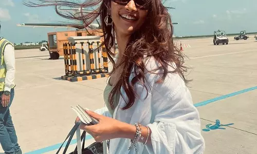 Pooja Hegdes Airport Look with a Dash of Cheer Pooja Hegdes Airport Look with a Dash of Cheer