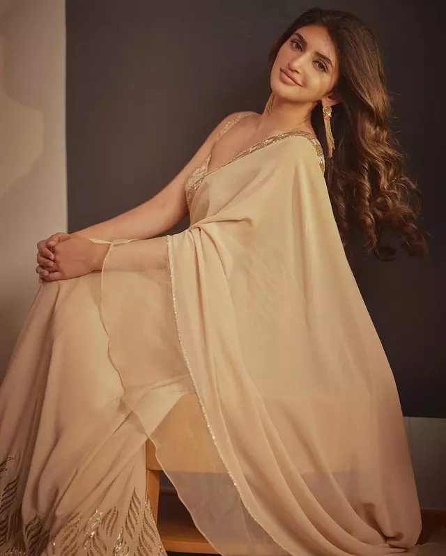 Sreeleelas Grace in Cream: A Stunning Half Saree Affair