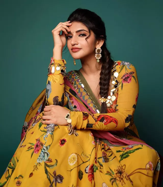 Sreeleelas Grace in Cream: A Stunning Half Saree Affair