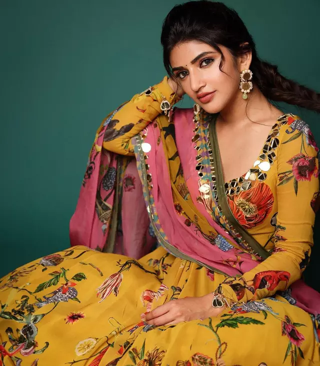 Sreeleelas Grace in Cream: A Stunning Half Saree Affair