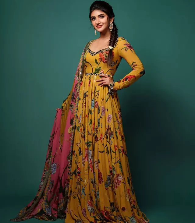 Sreeleelas Grace in Cream: A Stunning Half Saree Affair