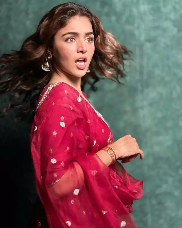 Wamiqa Gabbi Radiates Elegance in Traditional Red Anarkali Wamiqa Gabbi Radiates Elegance in Traditional Red Anarkali