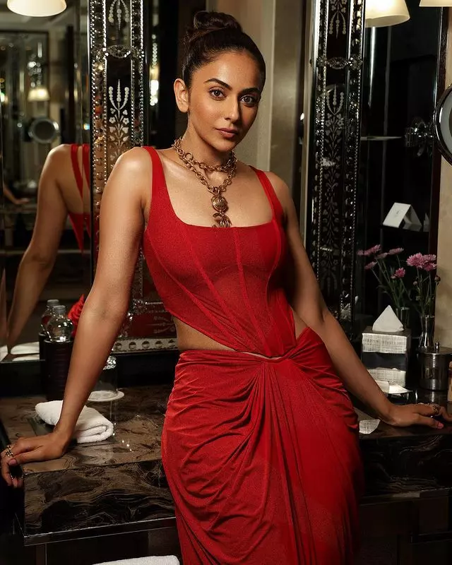 Riveting Poses Of Rakul In Ravishing Red Outfit!