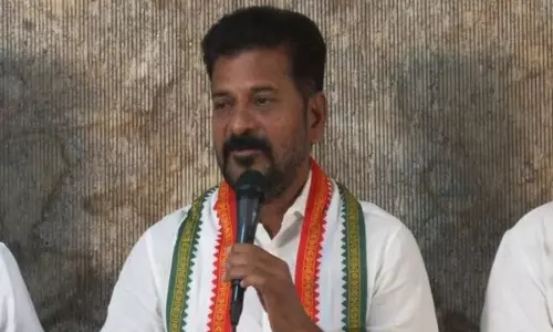 అది నిరూపిస్తే పోటీకి దూరం..  సీఎం కేసీఆర్ కు రేవంత్ సంచలన సవాలు