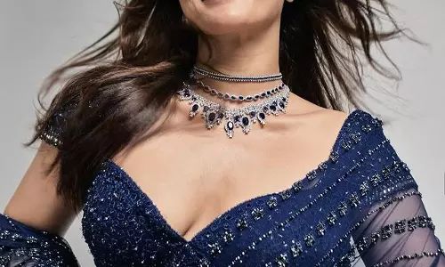 Wamiqa Gabbis Fiery Glamour in Navy Blue Saree