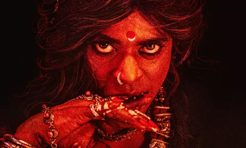 గుర్తు పట్టారా... కాంచన ను మించాడుగా...!