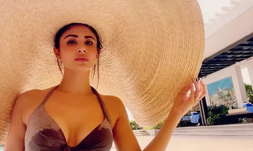 Teasing Treat From Mouni Roy