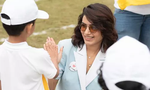 Suave Looking Sam Spends Time With Kids At Ekam!