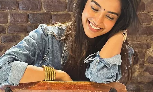 Meenakshi Chaudharys Glamorous Display of Elegance