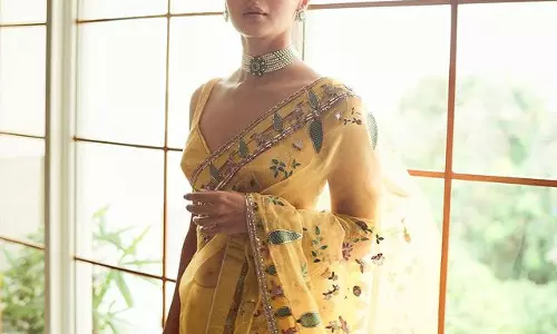 Alia Bhatt Shines in a Stunning Yellow Saree
