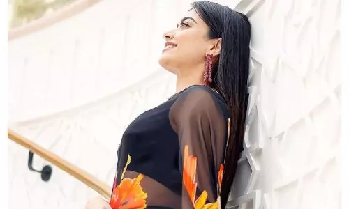 చీర‌లో వ‌ర్క‌వుట్లు ఎలా సాధ్యం ర‌ష్మికా?