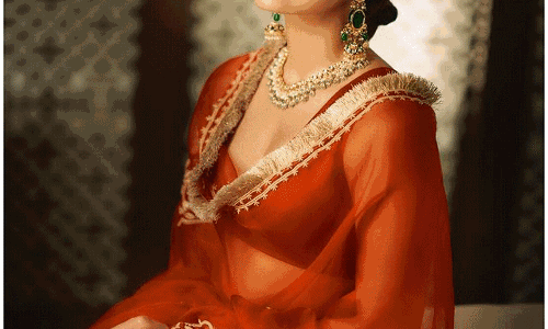 Rashmika Shines in Red as She Shares Sankranti Wishes