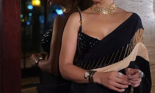 Sophies Golden Grace in Black Saree