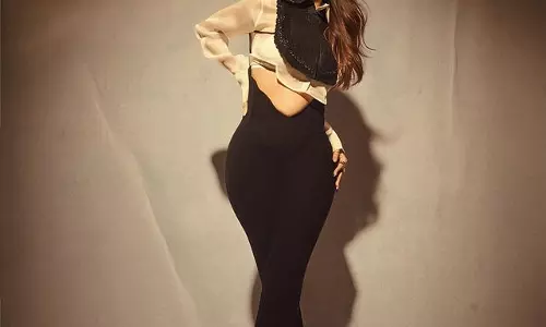 Malaika Aroras Stunning Black Collar Glam