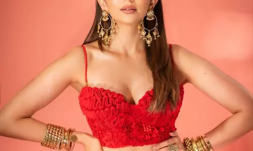 Rakul Preet Singhs Visual Delight in Cherry Red