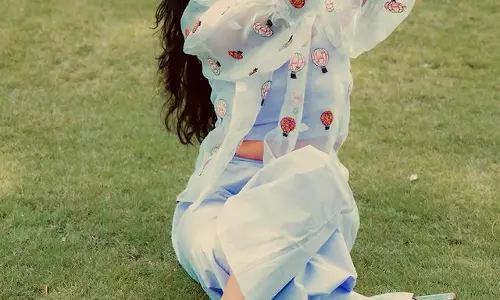 Chaithra looks as a flower in the garden