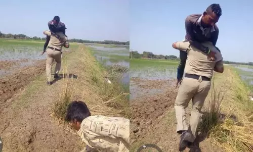 సూసైడ్ చేసుకున్న వ్యక్తిని సేవ్ చేసేందుకు 2కి.మీ. మోసుకెళ్లిన పోలీస్