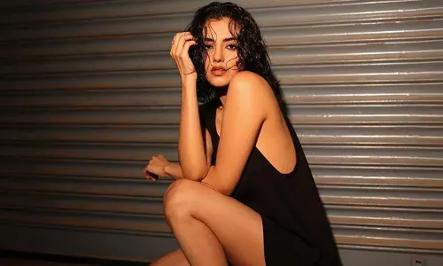 Black Dress & Boots, Malvika Sharma Sizzles