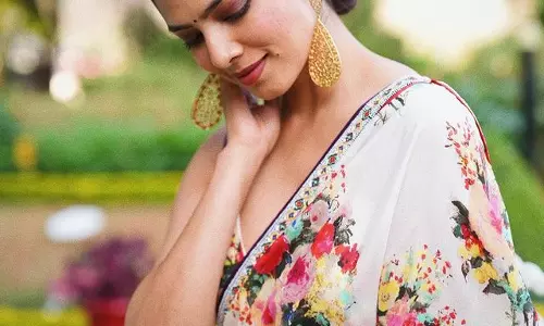 Malavika Mohanan Shines in Beautiful Floral Saree