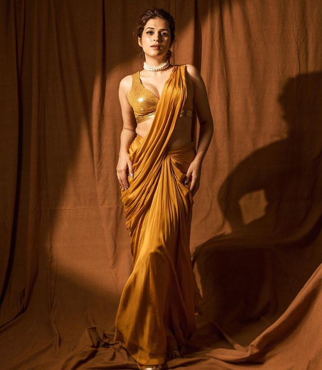 Shraddha Das Stunning Snaps in Orange Saree Shraddha Das Stunning Snaps in Orange Saree