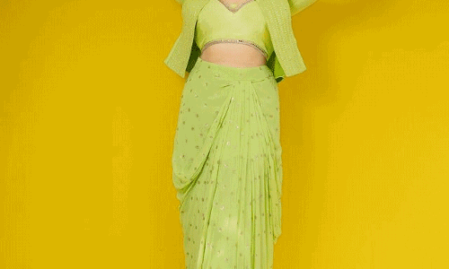 Sreemukhi Stuns in Green Saree