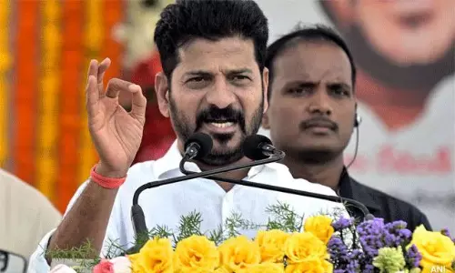 కేరళలో రేవంత్ చెప్పిన రెండు పరివార్ లు ఏమంటే?