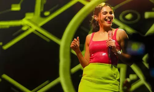 Beautiful Pictures of Actress Andrea Jeremiah Singing on Stage