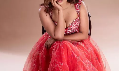 Hebha Patel Radiant in Tomato Red