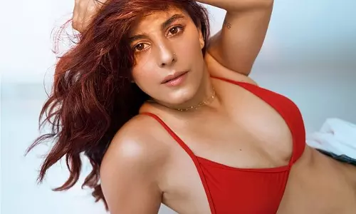 Isha’s striking red fashion statement.