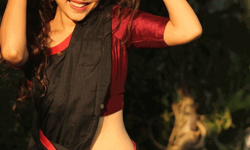 Varsha Bollamma: A Vision in Black and Red