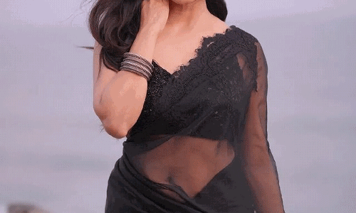 Malavika Mohanan Wows Fans with Stylish Black Saree Photos