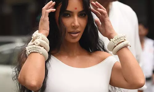 Kim Kardashians Shines Bright in White