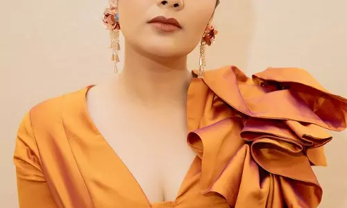 Sreemukhis Radiant Elegance in Amber