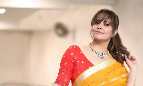 Anasuya Bharadwajs Timeless Style in Yellow Saree