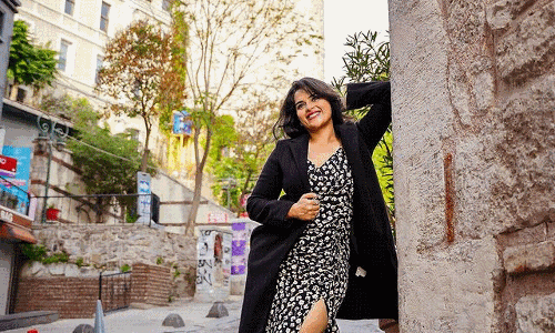 Pics: Bustling Kavya in thigh-slit dress