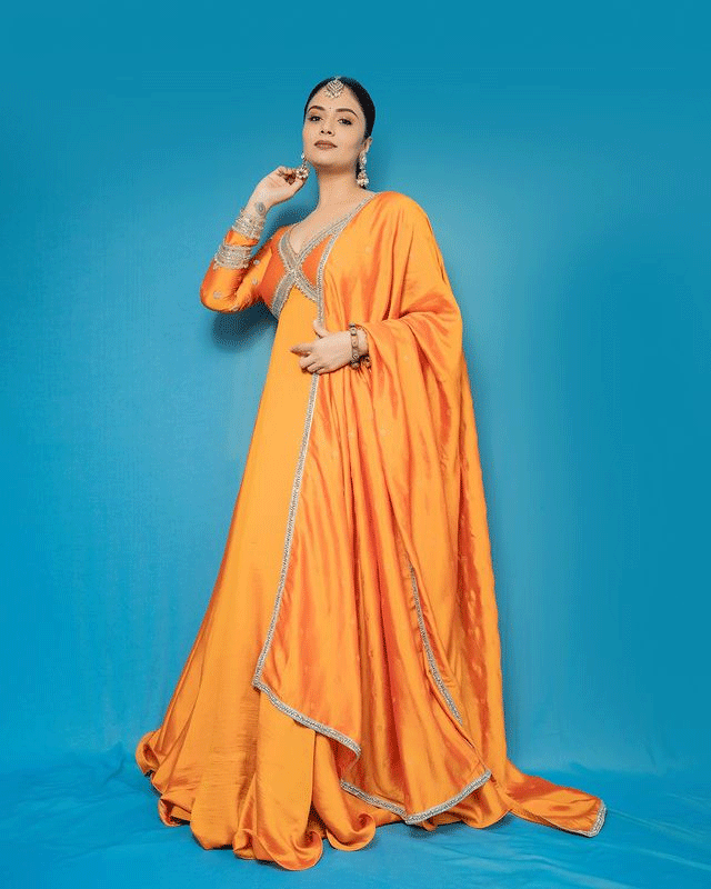 Sreemukhi’s Radiant Elegance in Orange Is All You Need to Check Sreemukhi’s Radiant Elegance in Orange Is All You Need to Check