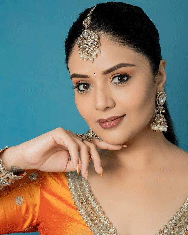 Sreemukhi’s Radiant Elegance in Orange Is All You Need to Check Sreemukhi’s Radiant Elegance in Orange Is All You Need to Check