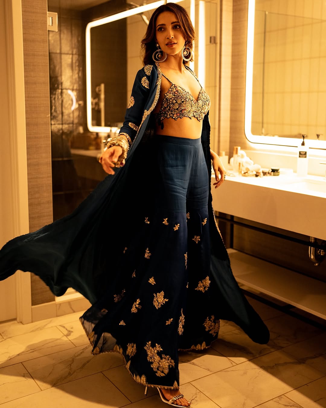 Neha Shetty proves her style is unbeatable in this dress. Neha Shetty proves her style is unbeatable in this dress.