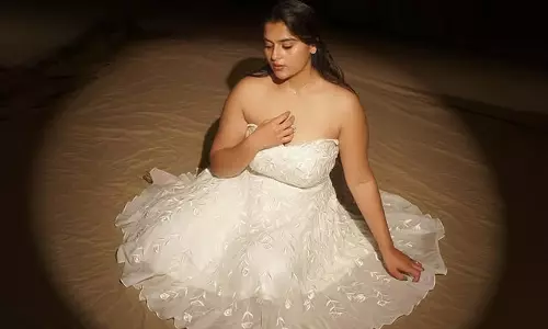 Kavya aces the art of styling white gown