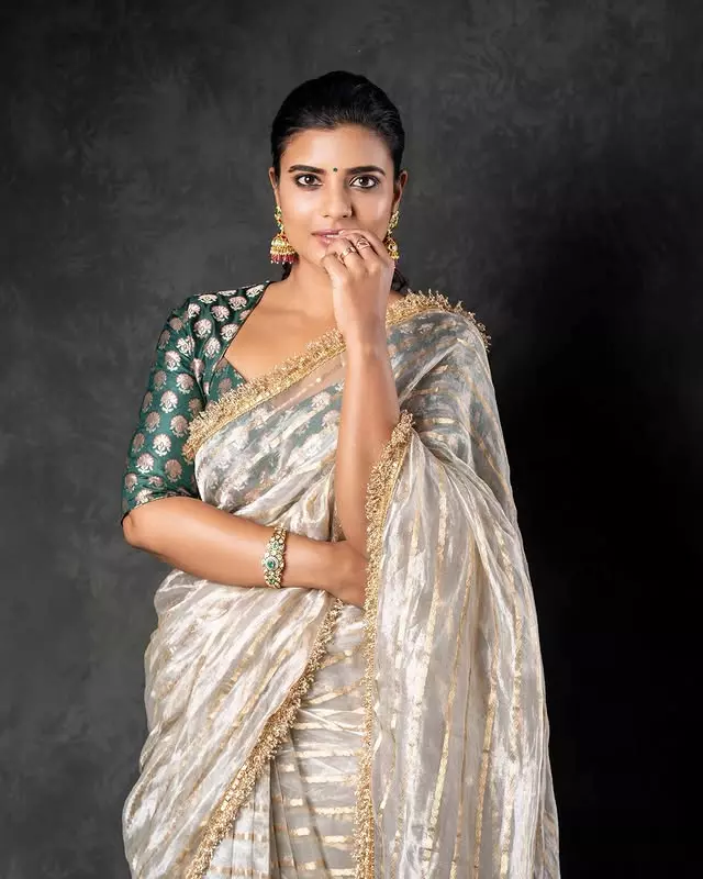 Aishwarya Rajesh Stuns in a Vibrant Orange Saree Aishwarya Rajesh Stuns in a Vibrant Orange Saree