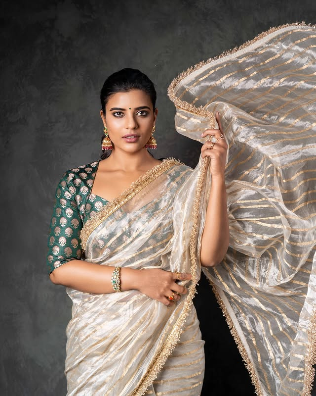 Aishwarya Rajesh Stuns in a Vibrant Orange Saree Aishwarya Rajesh Stuns in a Vibrant Orange Saree