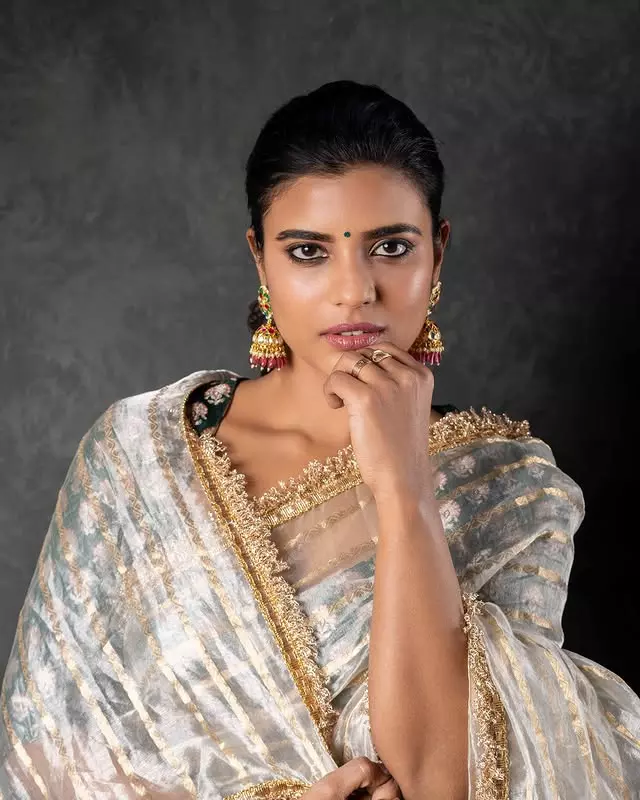 Aishwarya Rajesh Stuns in a Vibrant Orange Saree Aishwarya Rajesh Stuns in a Vibrant Orange Saree