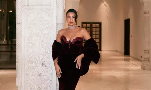 Nora Fatehi Looks Elegant in a Velvet Dress at IIFA 2025