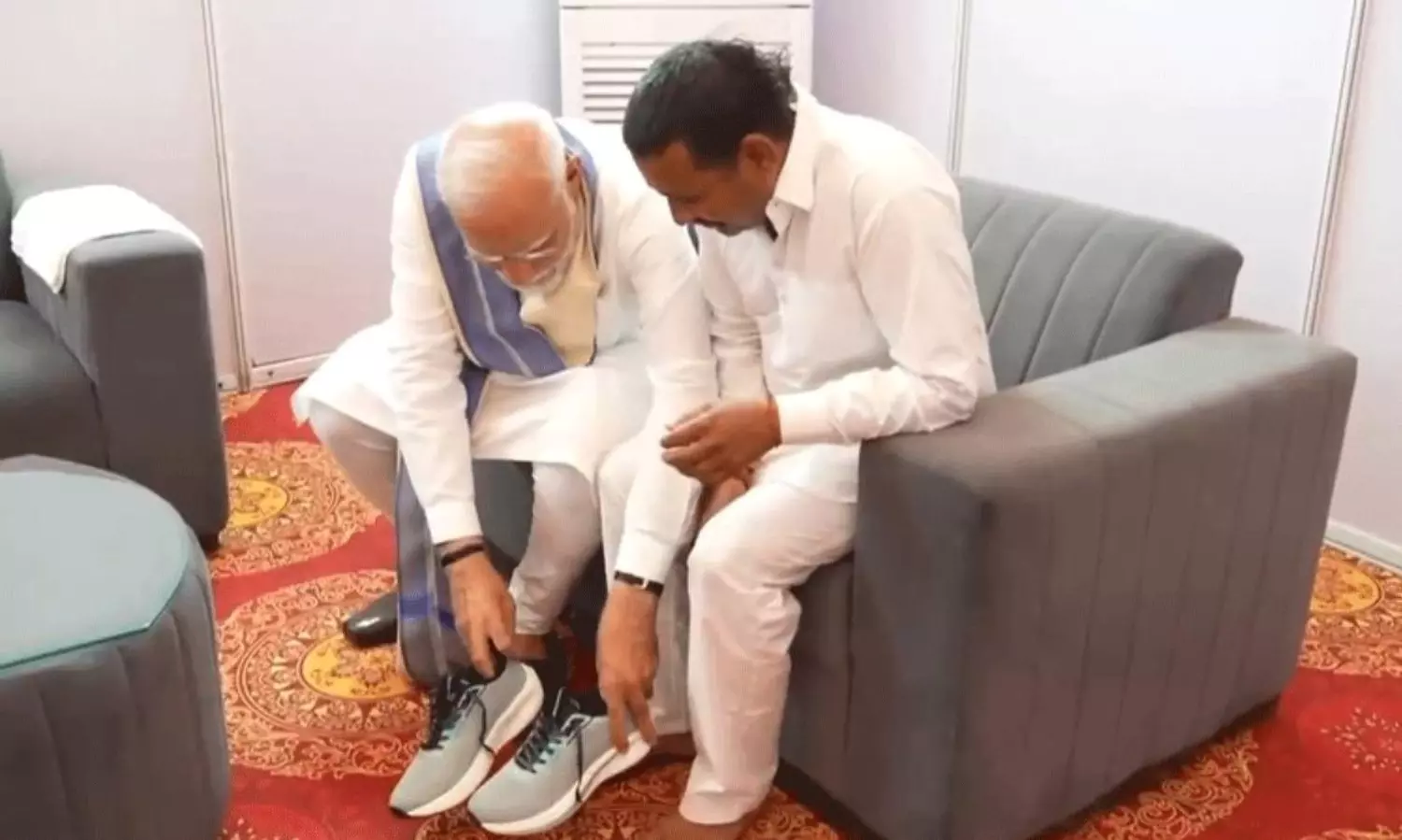 PM Modi Gifts Shoes to Devoted Supporter Who Walked Barefoot PM Modi Gifts Shoes to Devoted Supporter Who Walked Barefoot